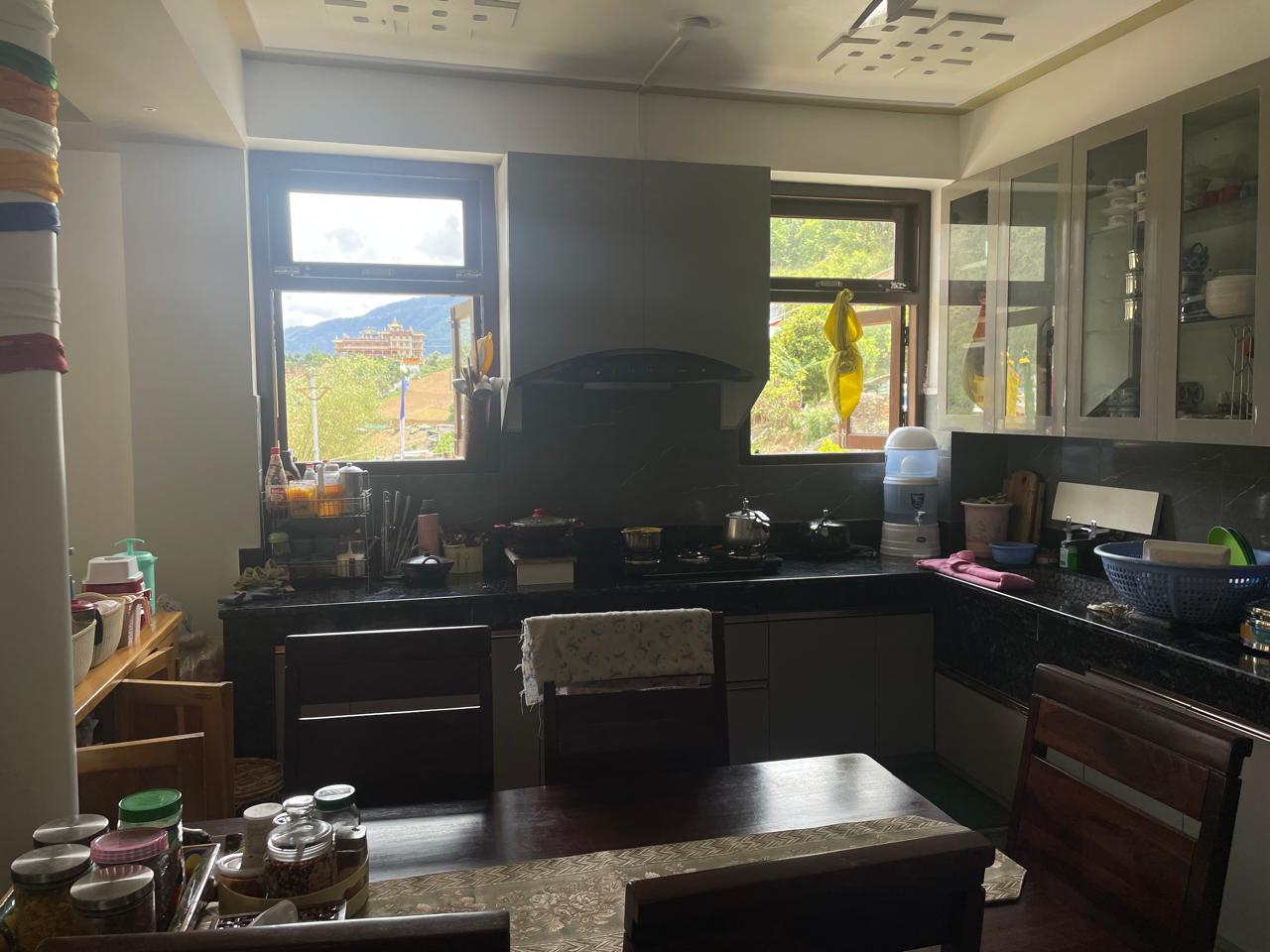 Nangsa Homestay open kitchen with monastery view Dirang Arunachal Pradesh