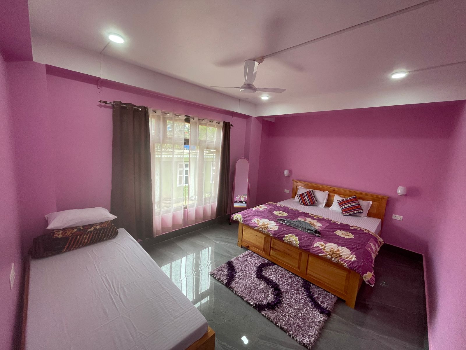 Nangsa Homestay Pink Deluxe Room with king bed and valley view Dirang Arunachal Pradesh